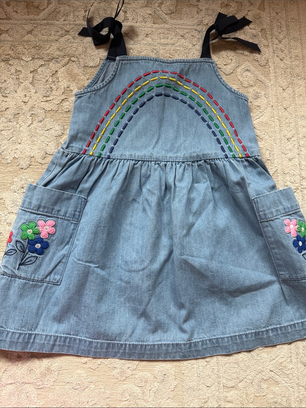 Hanna Andersson Denim Sundress with Rainbow Stitching and Floral Pockets